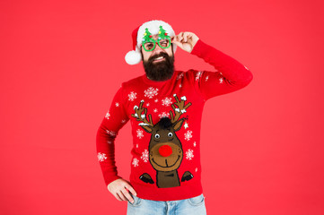 Sweater with deer. Hipster bearded man wear winter sweater and hat. Knitted sweater. Happy new year. Christmas spirit. Winter party outfit. Clothes shop. Buy festive clothing. Holidays accessories