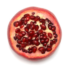 Pomegranate half isolated on white background. Top view, flat lay