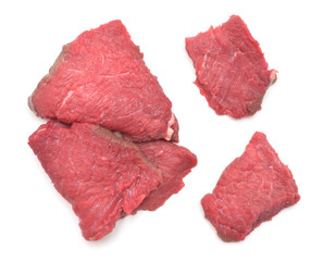 Fresh veal meat isolated on a white background. Raw beef steak. Top view, flat lay