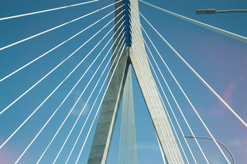Fototapeta premium Close-up of cable-stayed bridge, view from below.
