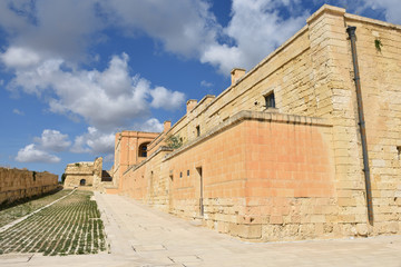 Fort Manoel is a historic landmark at the Manoel island in the Mediterranian sea, near Gzira town, Malta - 303932543