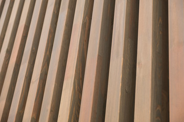 Building facade with modern wooden vertical planks