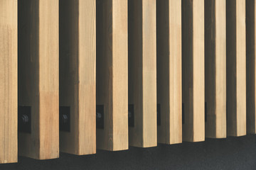 Building facade with modern wooden vertical planks