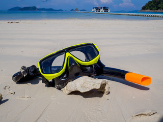 Snorkel on white sand beach with blue sky background, Enjoy snorkeling Tour on your holidays