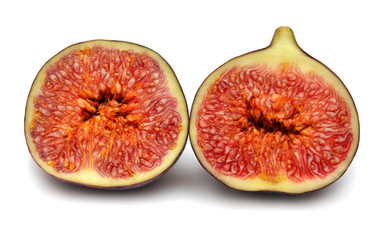 Figs fresh juicy. Two half fruit isolated on a white background. Food photo. Top view, flat lay