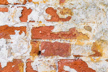 Fragment of a brick wall of an old building