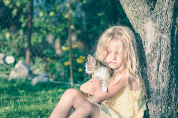 child and domestic cat together