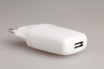 charger for smartphone or tablet from the network with micro USB cable, detachable cable, power supply