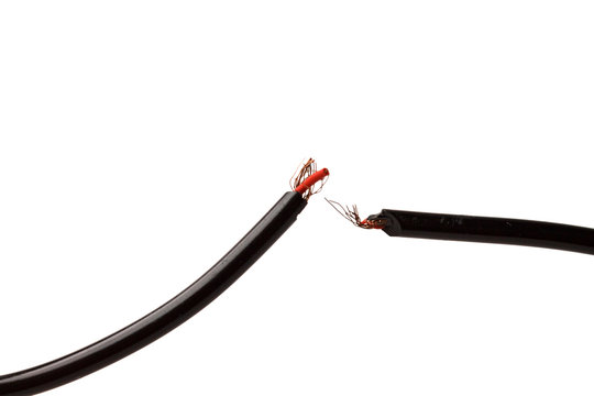 broken electrical cable with protruding wires and contacts isolated on white background