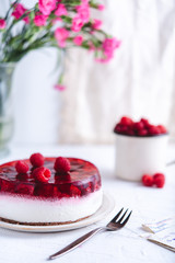 Delicious no bake cheesecake on white background