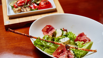 salad italian style with prosciutto