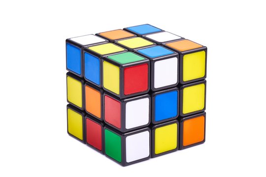 BUDAPEST, HUNGARY - SEPTEMBER 1, 2018: Unsolved Rubik's cube logic game on white studio background