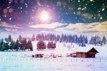 Fairy-tale winter landscape and cottage in woods at winter. Christmas concept.