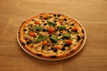 tasty delicious pizza food on a wooden background 