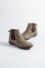 Botas de mujer, moda Otoño-Invierno sobre fondo blanco
