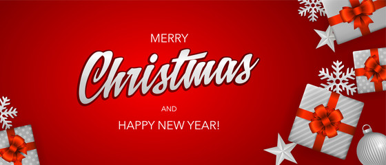 Obraz na płótnie Canvas Merry Christmas and Happy New Year red background web header with silver glitter elements and calligraphy