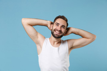 Close up bearded young man 20s years old perfect skin wearing white shirt isolated on blue pastel wall background, studio portrait. Skin care healthcare cosmetic procedures concept. Mock up copy space