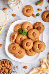 Delicious homemade almond cookies, served with glass of milk
