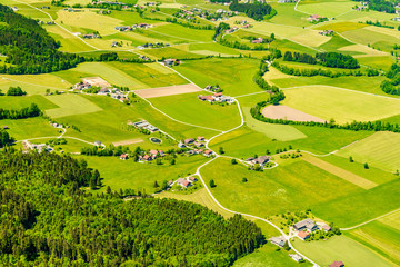 Aerial view on colorful small field parcels near Mondsee, Austria, Europe