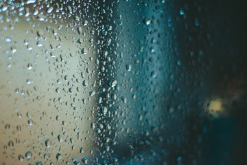 Naklejka na ściany i meble Raindrops on the window