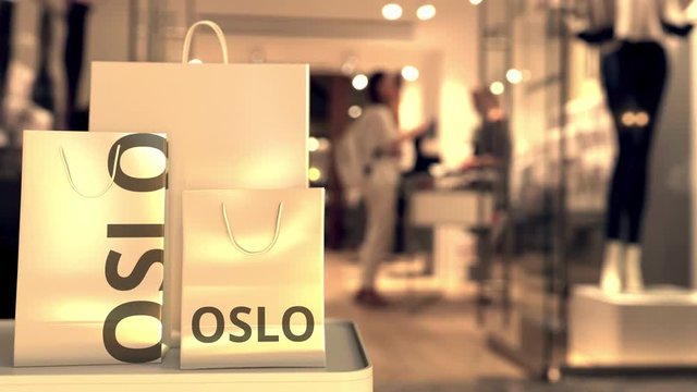 Shopping bags with Oslo text. Shopping in Norway related conceptual 3D animation