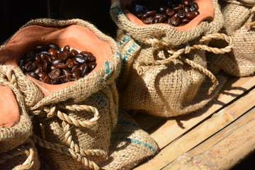 Fototapeta na wymiar Coffee beans in a container