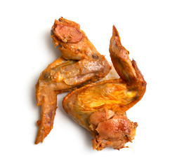 Fried chicken wings on a white background.