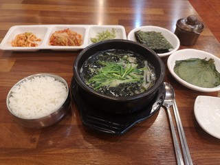 bowl of rice and chopsticks