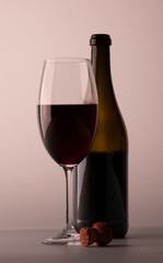 Wineglass red wine black bottle cork