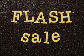 Fototapeta premium Flash Sale alphabet letter on black glitter background