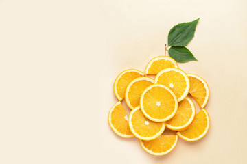 Composition with fresh orange slices on light background