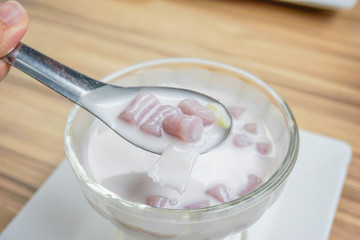 Small round balls made from taro mixed with tapioca flour with sweet coconut milk, Thai dessert called Bualoy.