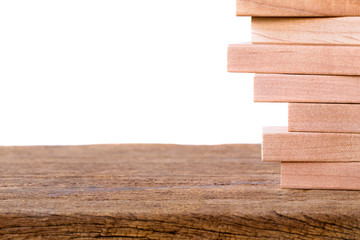 blocks wood on wooded floor white background. picture for add text or graphic design.