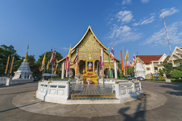 Wat Chedi Luang temple which with a large pagoda and big golden buddha in the Chiang Mai, Thailand