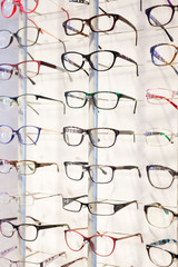 Glasses showcase in modern optic shop