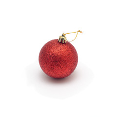 One red Christmas ball isolated on white background.