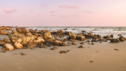 Fototapeta na wymiar Landscape with rock on the beach, sunset view, panorama, Rayong, Thailand