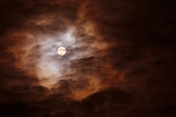 Naklejka na ściany i meble Full moon dark cloudy sky.horizontal frame.
