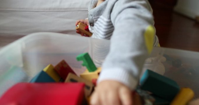 Cute Baby Toddler Grabbing Toy From Box