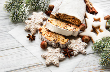 Christmas stollen on wooden background