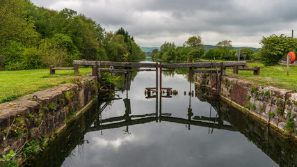 Obraz premium The closed gates of the sluice leading into the Ulverston Canal in Canal Foot, Cumbria, England, UK