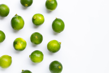 Fresh limes on white background. Copy space