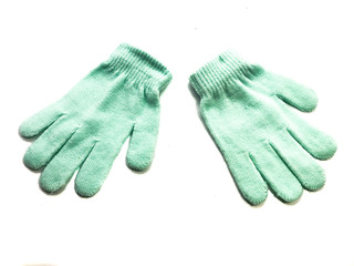 Gloves for children isolated on a white background. Children's clothing for the winter. Gloves for the smallest. Warm mittens.