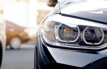 The front lights of the sports car.