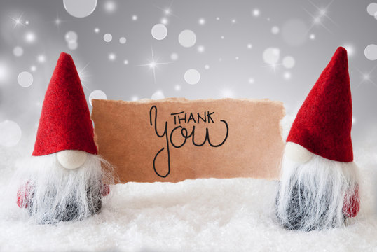 Sign With English Calligraphy Thank You. Santa Claus With Red Hat. Snow With Gray Sparkling Background