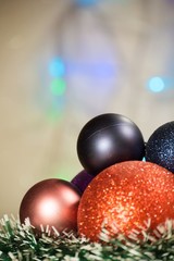 Christmas background with shiny colored toys.