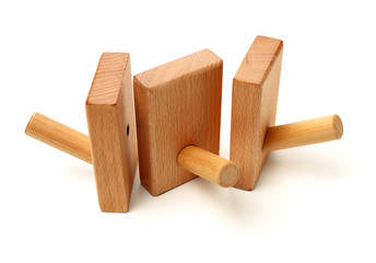 Wooden abstract wall hook isolated on white background