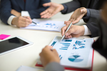 After meeting business people shaking hands with new partner meeting  to jointly invest in business together.