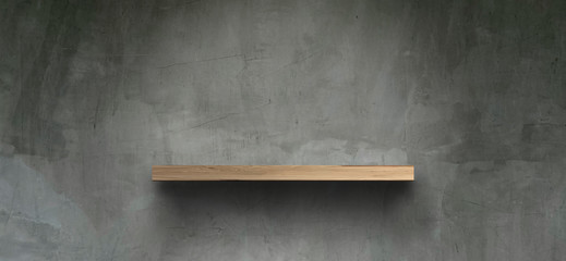 Empty wooden shelves on the floor, bare concrete walls For placing products Or product