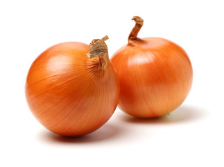 Gold onion vegetable bulbs on white background